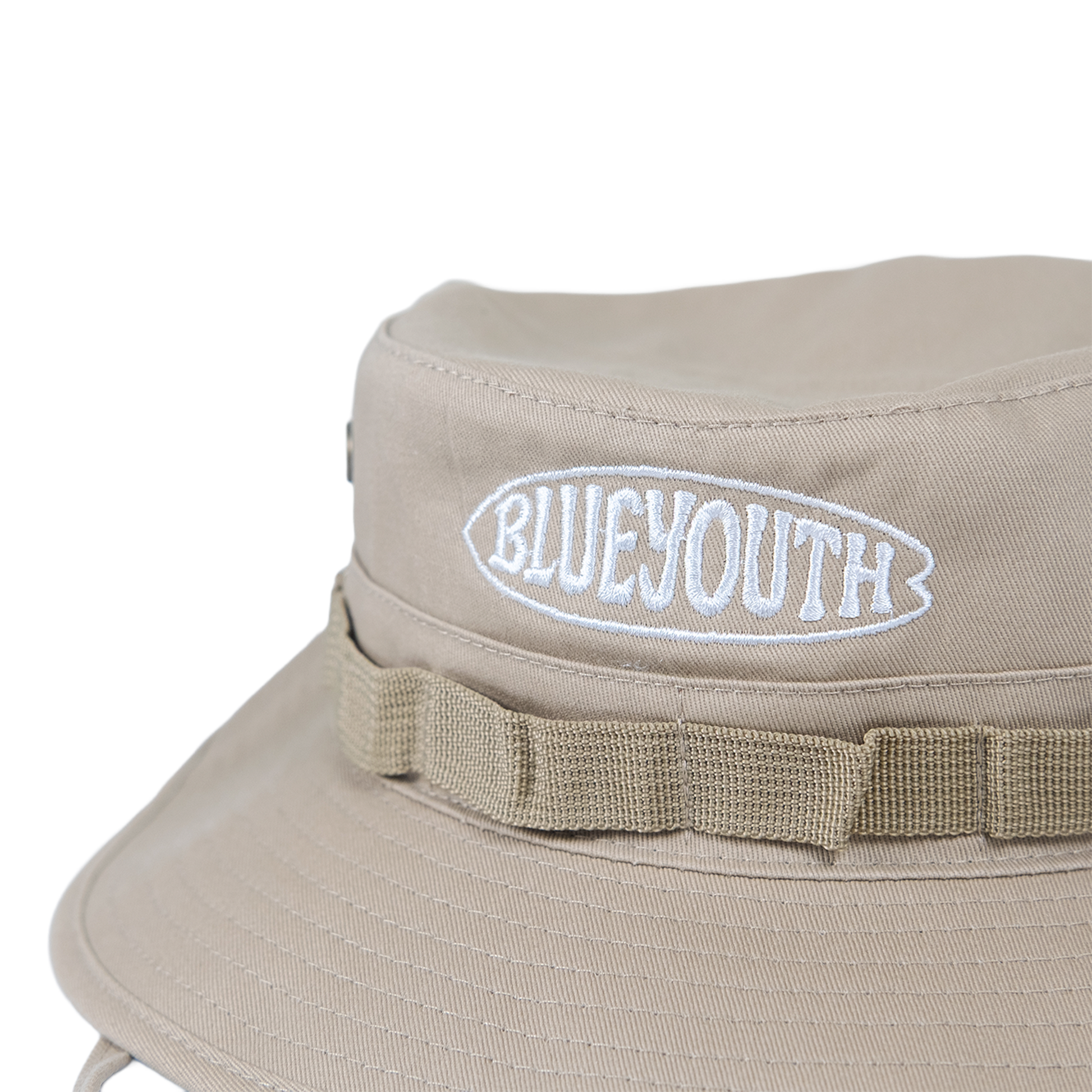 Bucket  hat color beige blue youth con un longboard